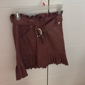 Zara leather skirt size XS. Never worn. Wine color.